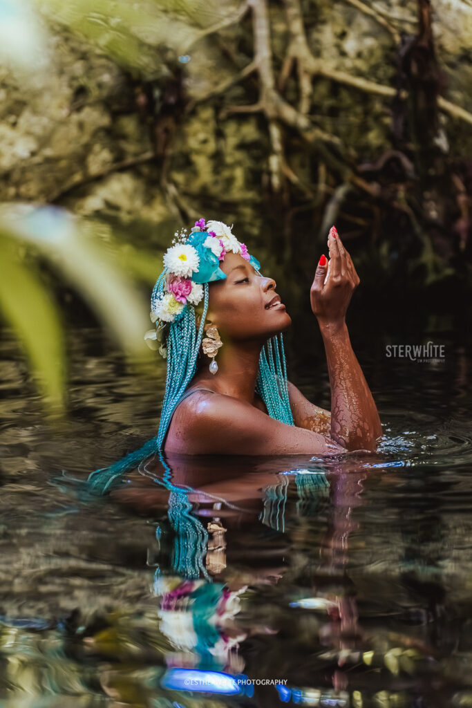Jungle birthday photoshoot with handmade flower crown in a cenote of Tulum